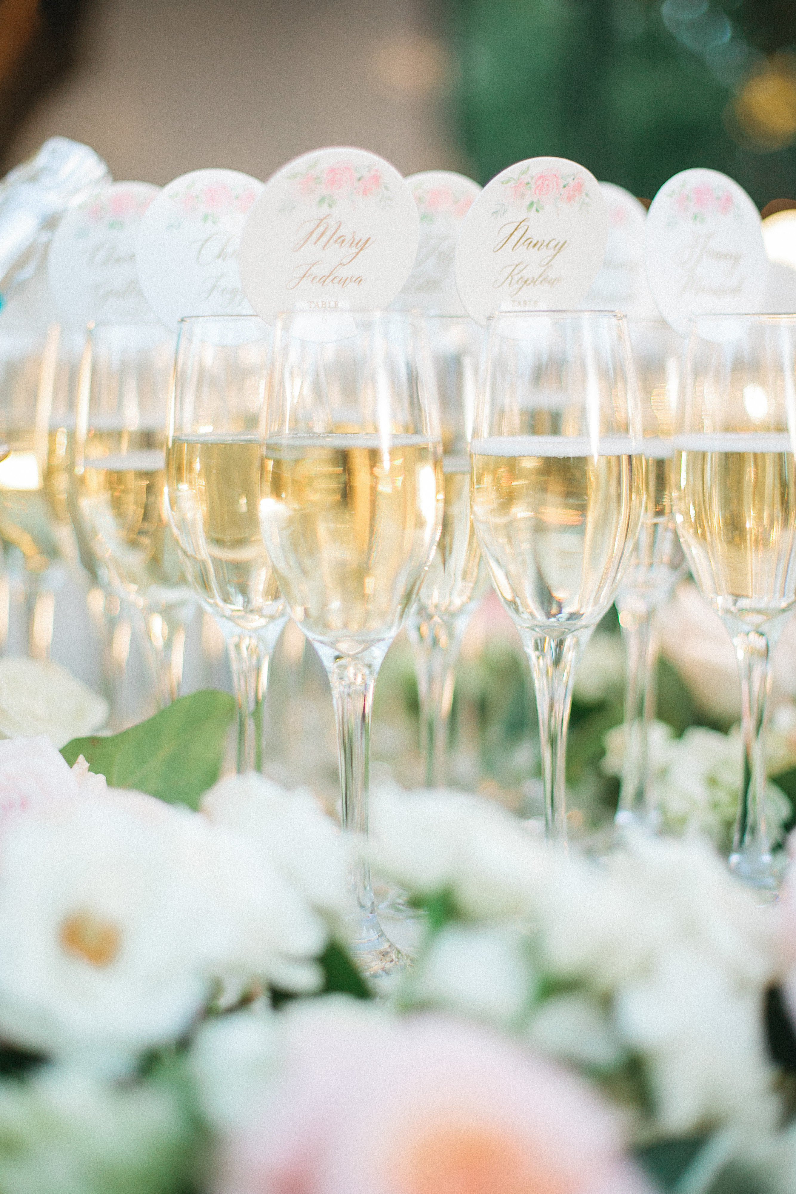 Champagne glasses and flowers